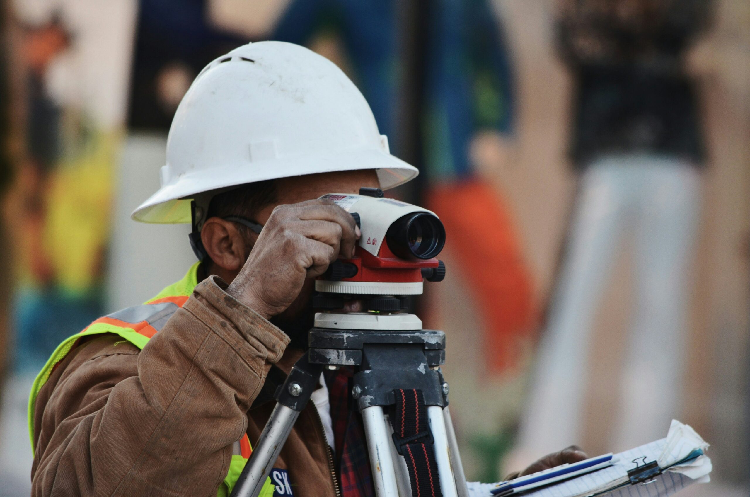 Man in hard hat performing building inspection