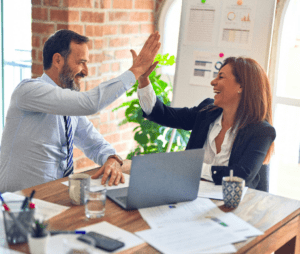 two people high fiving